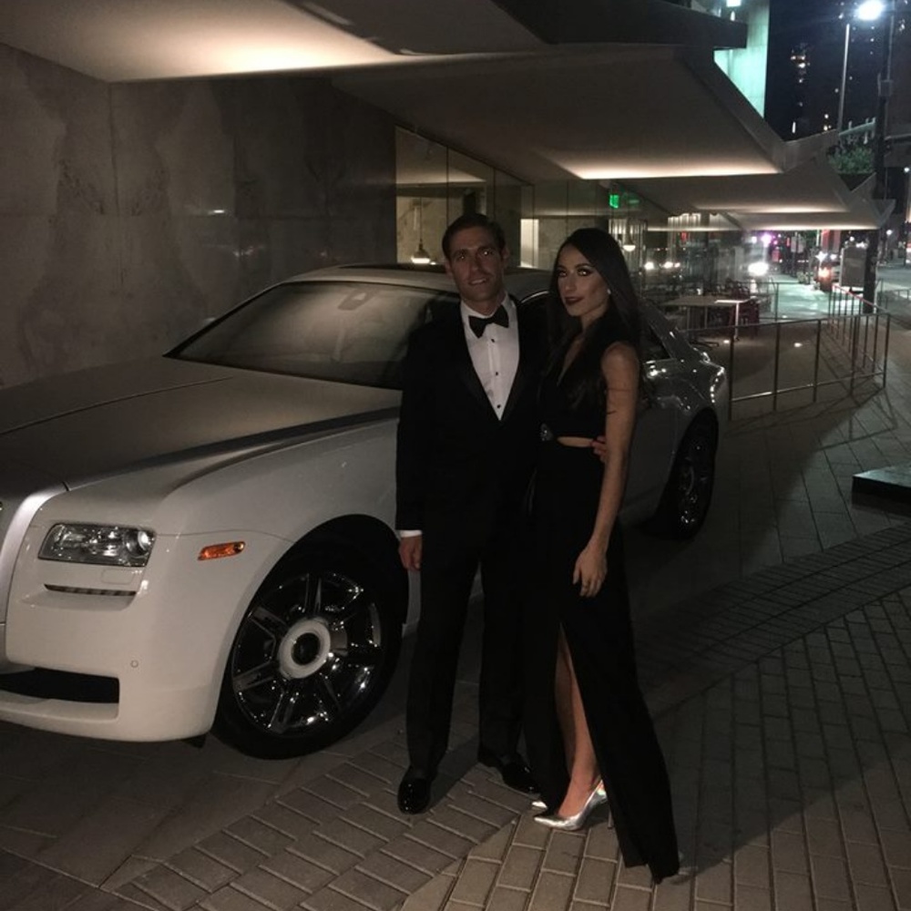 MW and I in Dallas, casually driving cadillacs.